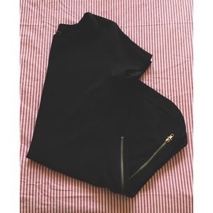 Simple black tunic dress with brass zip detailing